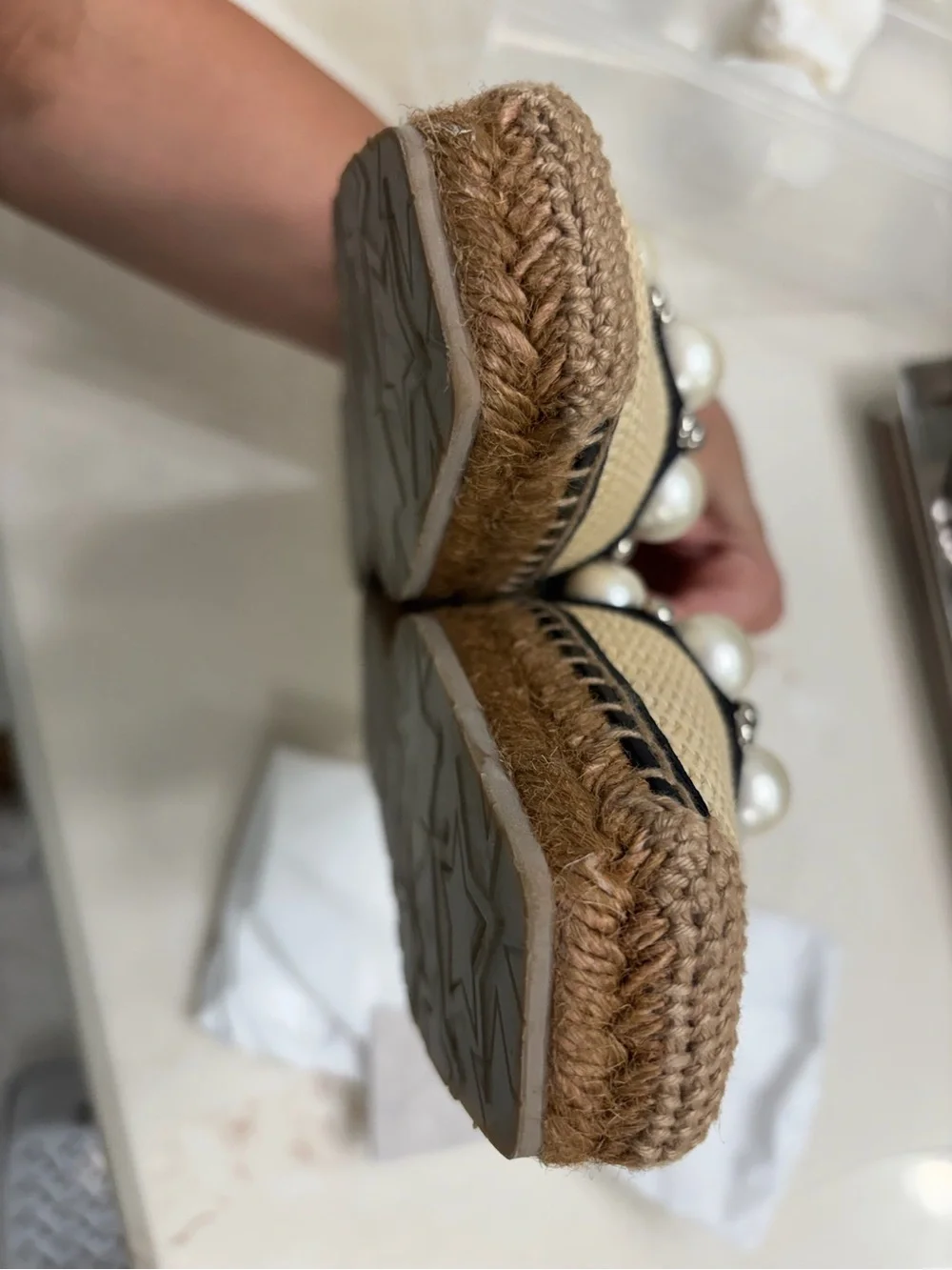 Jimmy Choo Natural Straw Slip-On Flats with Black Trim and Pearl Embellishments
